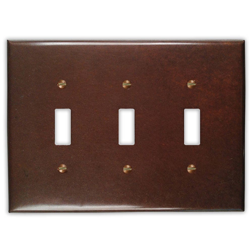 Triple Toggle Copper Switch Plate in Rustic