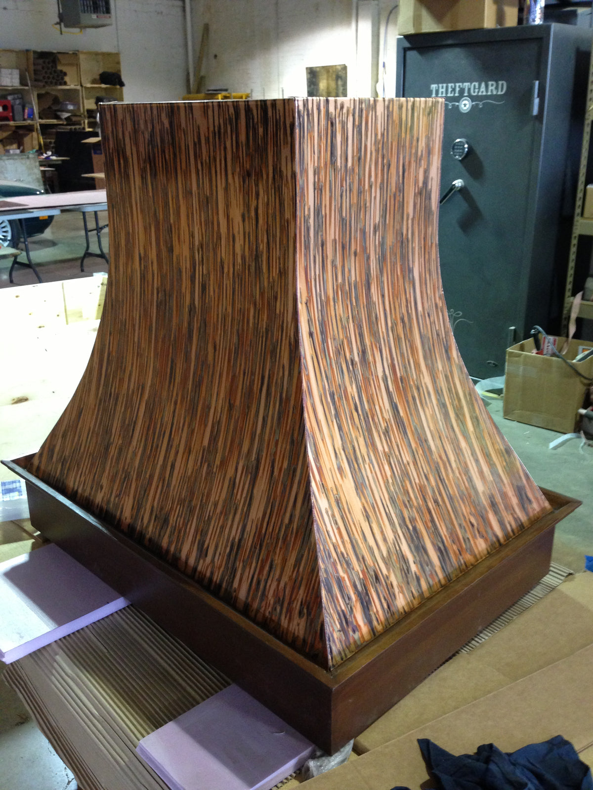 Range hood covered in Enchantment heavy gauge patina copper