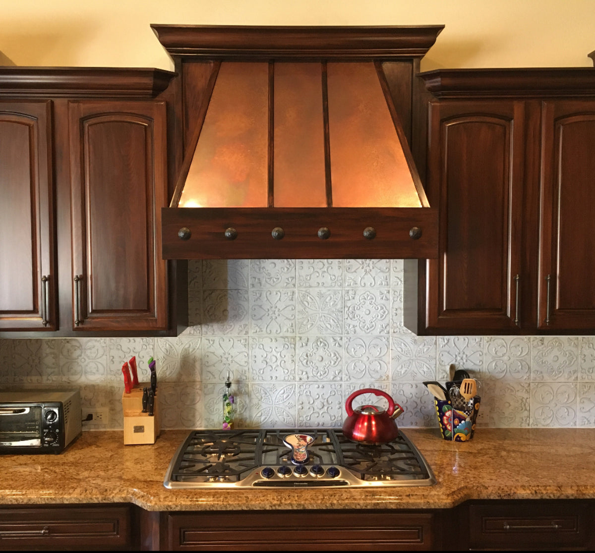 Range hood covered in Antique heavy gauge patina copper