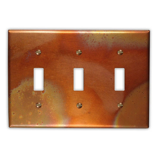 Triple Toggle Copper Switch Plate in Flamed
